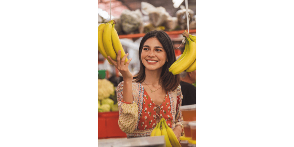 Lady holding bananas