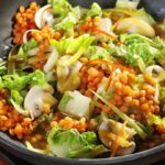 bowl of prepared lentil and vegetable stir fry