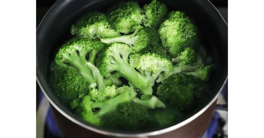 Bowls of sliced broccoli Cats Coming