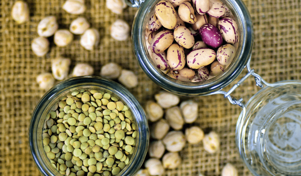 legumes on bowl upon a jute bag