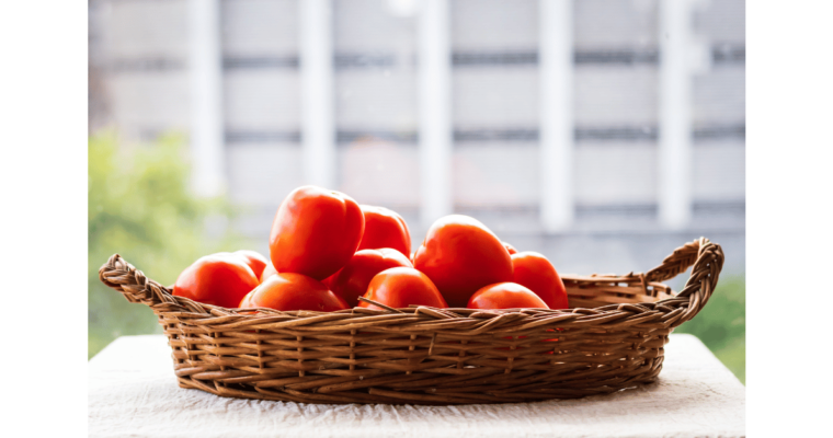 red tomatoes in a basket