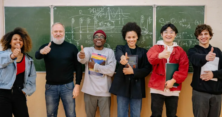 Professor with his students in front of the writing board similar to those of Rhodes University where the study on plant-based living at south African Universities was conducted.